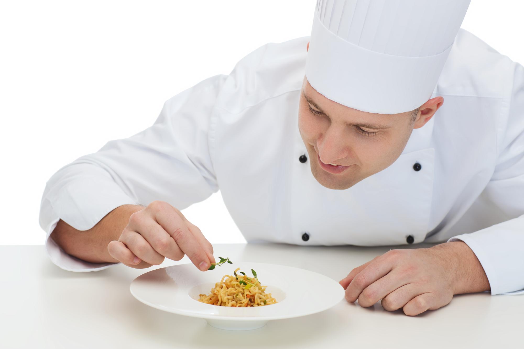 Chef plating a quick weeknight dinner